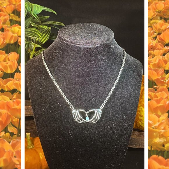 Silver-toned Skeleton Hand Necklace - Picture 1 of 4